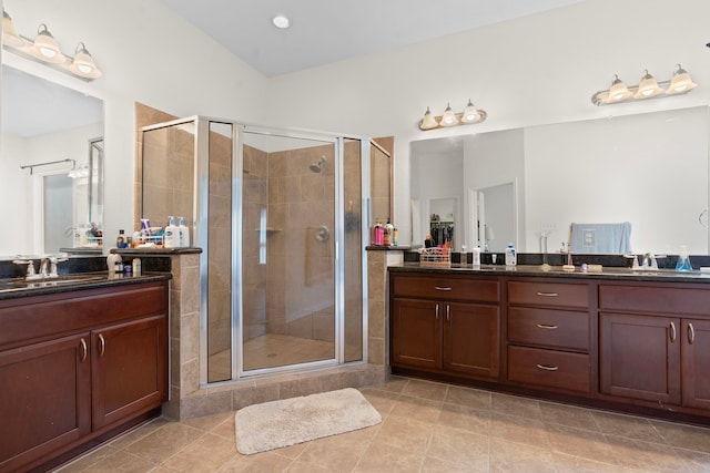 24914 Hazel Ranch Dr, Katy, TX 77494 - full bath featuring double vanity, a stall shower, and tile patterned flooring
