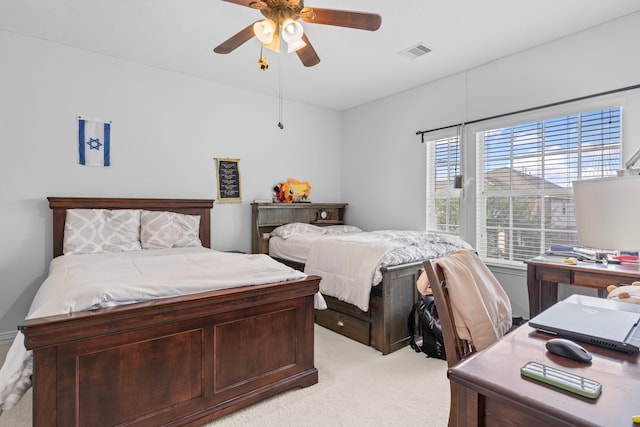 24914 Hazel Ranch Dr, Katy, TX 77494 - bedroom featuring light colored carpet, an office area, and a ceiling fan