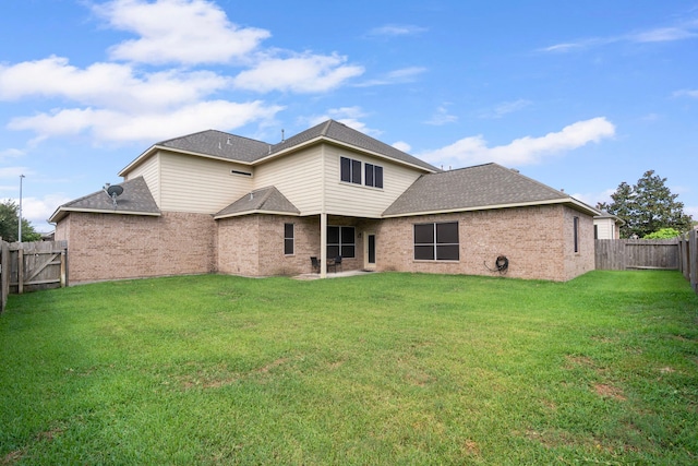 24914 Hazel Ranch Dr, Katy, TX 77494 - rear view of property with brick siding, roof with shingles, and a patio