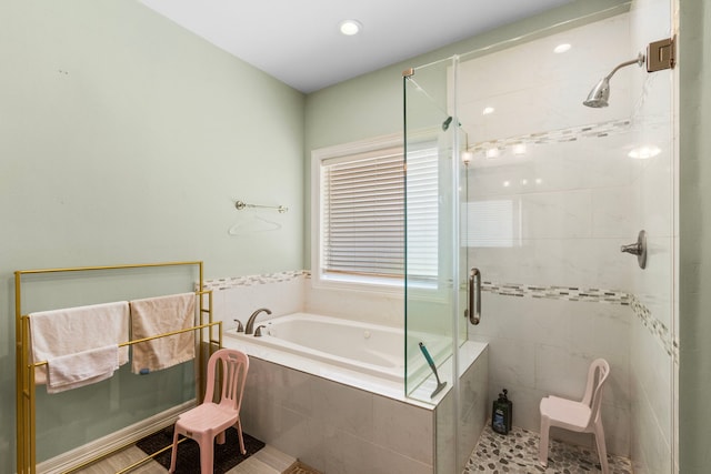 548 Cascade St, Bellaire, TX 77401 - full bathroom featuring a bath, a shower stall, and recessed lighting