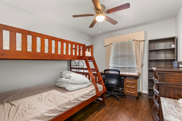 548 Cascade St, Bellaire, TX 77401 - bedroom with dark wood-type flooring, a desk, and a ceiling fan
