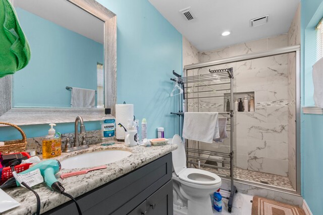 548 Cascade St, Bellaire, TX 77401 - full bath featuring vanity, a marble finish shower, and toilet