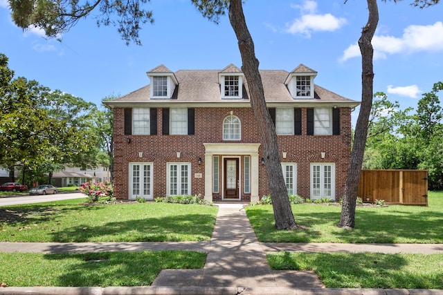 548 Cascade St, Bellaire, TX 77401 - colonial house featuring brick siding