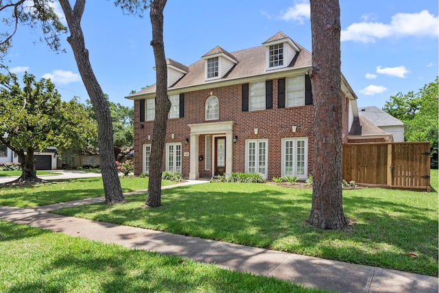 548 Cascade St, Bellaire, TX 77401 - colonial inspired home featuring brick siding