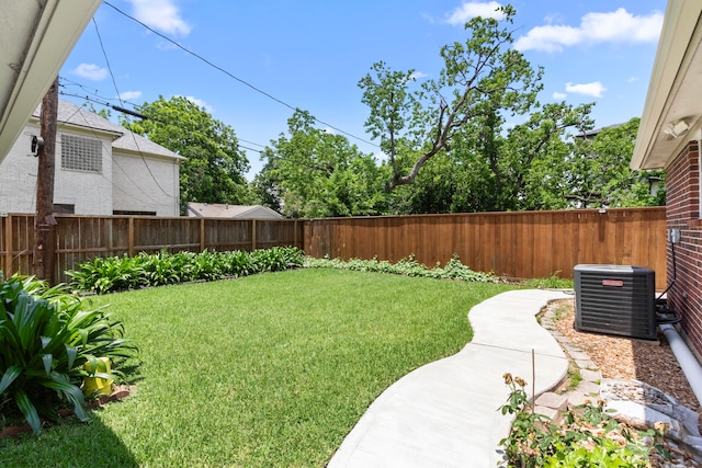 548 Cascade St, Bellaire, TX 77401 - view of yard featuring central air condition unit