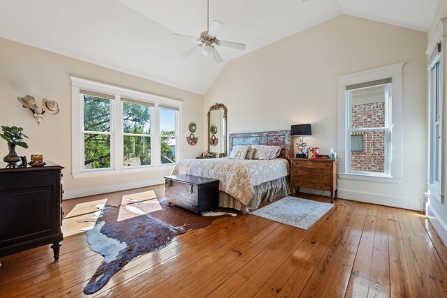 940 Columbia St, Houston, TX 77008 - bedroom featuring wood-type flooring, ceiling fan, baseboards, and high vaulted ceiling