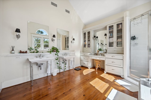940 Columbia St, Houston, TX 77008 - full bathroom with a stall shower and hardwood / wood-style flooring