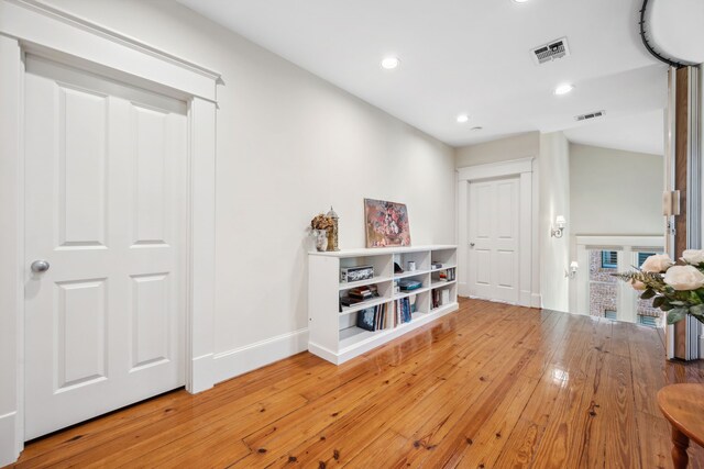 940 Columbia St, Houston, TX 77008 - corridor with light wood finished floors, baseboards, and recessed lighting