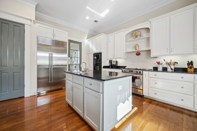 940 Columbia St, Houston, TX 77008 - kitchen featuring black appliances, a sink, open shelves, white cabinets, and ornamental molding