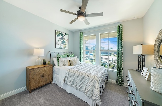 19318 Stagecoach Breeze Ln, Tomball, TX 77377 - bedroom with baseboards, carpet flooring, and a ceiling fan