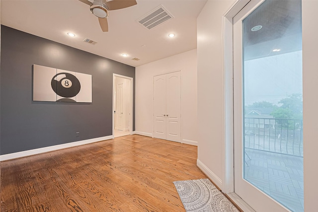 1035 Herkimer St, Houston, TX 77008 - unfurnished room with ceiling fan, light wood-style floors, baseboards, and recessed lighting