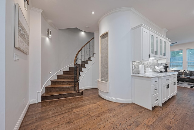 1035 Herkimer St, Houston, TX 77008 - staircase with wood finished floors, recessed lighting, and baseboards