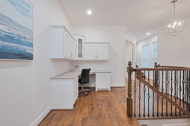 1035 Herkimer St, Houston, TX 77008 - office area with built in study area, baseboards, light wood-style flooring, recessed lighting, and a chandelier