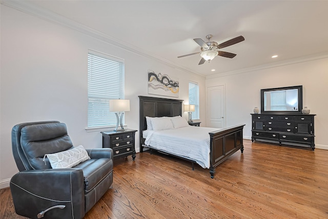 1035 Herkimer St, Houston, TX 77008 - bedroom featuring crown molding, wood finished floors, recessed lighting, ceiling fan, and baseboards
