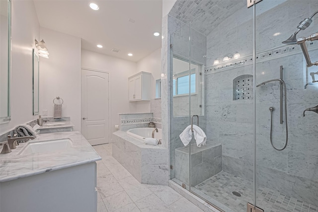 1035 Herkimer St, Houston, TX 77008 - full bathroom featuring a garden tub, double vanity, a stall shower, recessed lighting, and marble finish floors