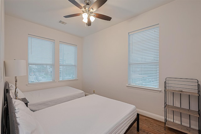 1035 Herkimer St, Houston, TX 77008 - bedroom featuring wood finished floors, baseboards, and ceiling fan