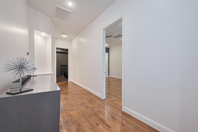 1035 Herkimer St, Houston, TX 77008 - corridor with light wood finished floors and baseboards