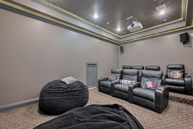 1035 Herkimer St, Houston, TX 77008 - home theater room featuring carpet, a tray ceiling, and ornamental molding