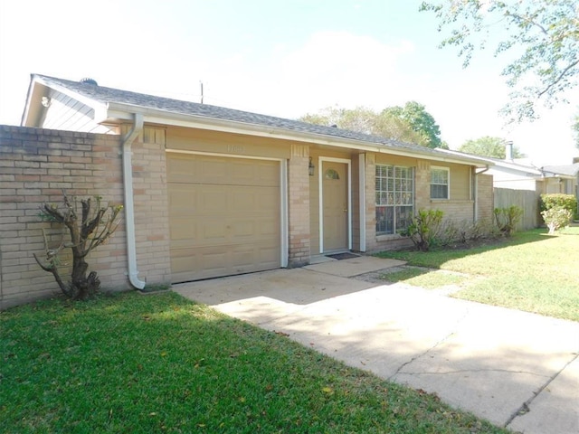 17002 Rippling Mill Dr, Sugar Land, TX 77498 - ranch-style home with an attached garage, concrete driveway, brick siding, and a front yard