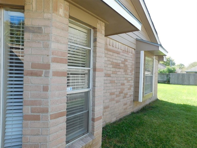 17002 Rippling Mill Dr, Sugar Land, TX 77498 - view of side of property with brick siding