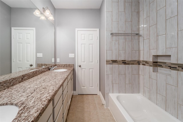 14619 Sanour Dr, Houston, TX 77084 - full bath with vanity, tile patterned floors, bathtub / shower combination, and baseboards