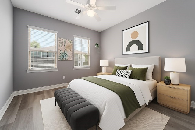14619 Sanour Dr, Houston, TX 77084 - bedroom with baseboards, wood finished floors, and a ceiling fan
