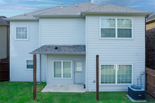 14619 Sanour Dr, Houston, TX 77084 - rear view of property featuring central AC and a patio
