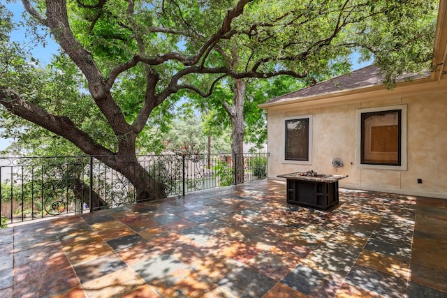 4922 Linden St, Bellaire, TX 77401 - view of patio with a fire pit