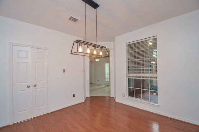 5319 Green Cove Bend Ln, Houston, TX 77041 - unfurnished dining area with wood finished floors and baseboards