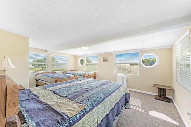 210 W Lakeview, Onalaska, TX 77360 - bedroom with carpet floors, baseboards, and a textured ceiling