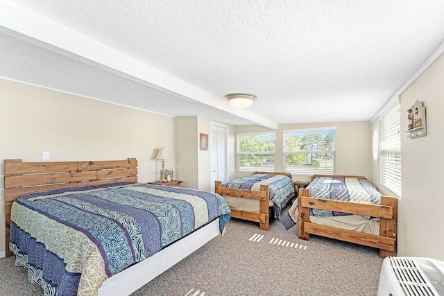210 W Lakeview, Onalaska, TX 77360 - carpeted bedroom with a textured ceiling