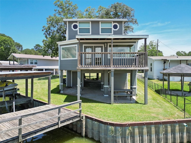 210 W Lakeview, Onalaska, TX 77360 - back of house with a deck, a sunroom, and a patio area
