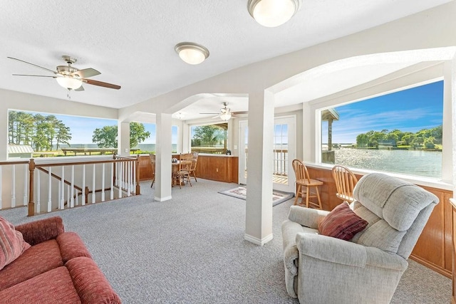 210 W Lakeview, Onalaska, TX 77360 - sunroom / solarium with a water view and arched walkways