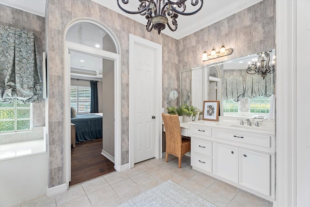 15222 Hilltop View Dr, Cypress, TX 77429 - ensuite bathroom with a chandelier, vanity, crown molding, and tile patterned floors