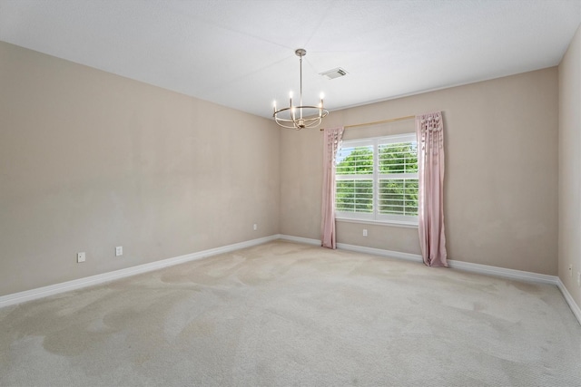15222 Hilltop View Dr, Cypress, TX 77429 - carpeted spare room featuring a chandelier and baseboards