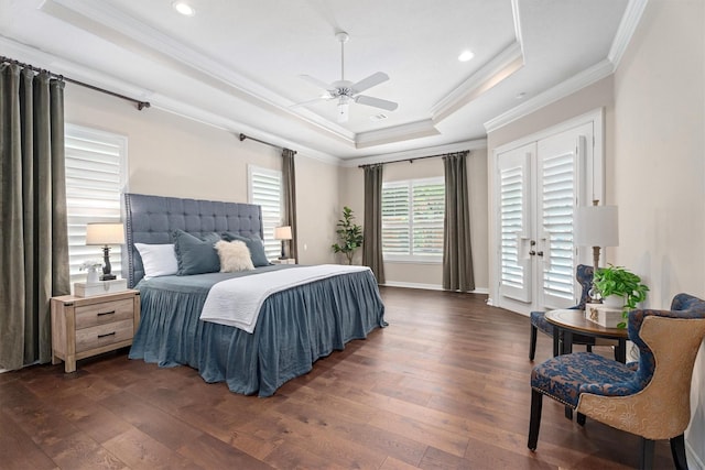 15222 Hilltop View Dr, Cypress, TX 77429 - bedroom with a raised ceiling, crown molding, dark wood-type flooring, recessed lighting, and access to exterior