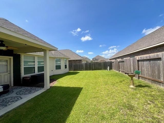 10809 Mendel Terrace Dr, Rosharon, TX 77583 - view of yard with ceiling fan