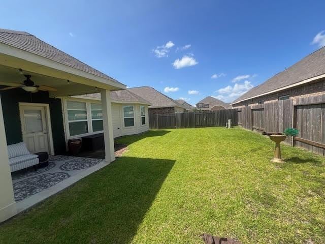 10809 Mendel Terrace Dr, Rosharon, TX 77583 - view of yard featuring a ceiling fan