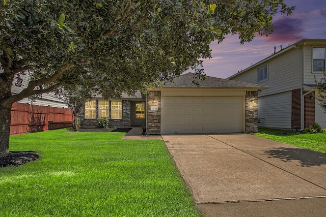 19238 Augusta Mist Ln, Katy, TX 77449 - view of front of home with driveway, an attached garage, and a shingled roof