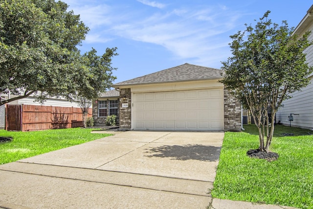 19238 Augusta Mist Ln, Katy, TX 77449 - view of front of house featuring an attached garage, concrete driveway, brick siding, and a shingled roof