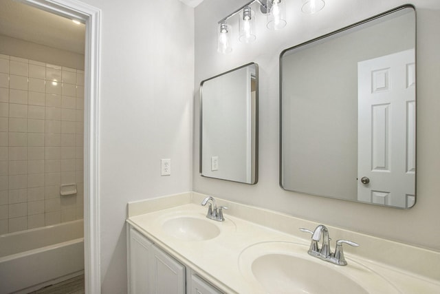 19238 Augusta Mist Ln, Katy, TX 77449 - bathroom featuring double vanity and washtub / shower combination