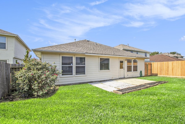19238 Augusta Mist Ln, Katy, TX 77449 - back of property with a patio area and roof with shingles