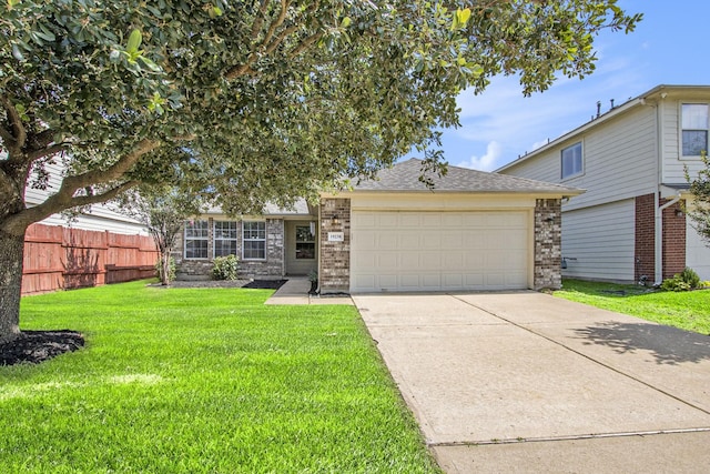 19238 Augusta Mist Ln, Katy, TX 77449 - view of front facade with a garage, driveway, brick siding, and roof with shingles