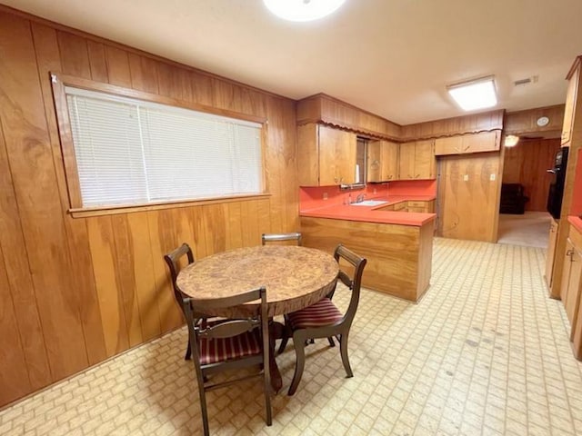 302 Cordell Dr, Crockett, TX 75835 - dining area featuring wooden walls and wet bar