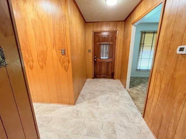 302 Cordell Dr, Crockett, TX 75835 - entryway with wooden walls and crown molding
