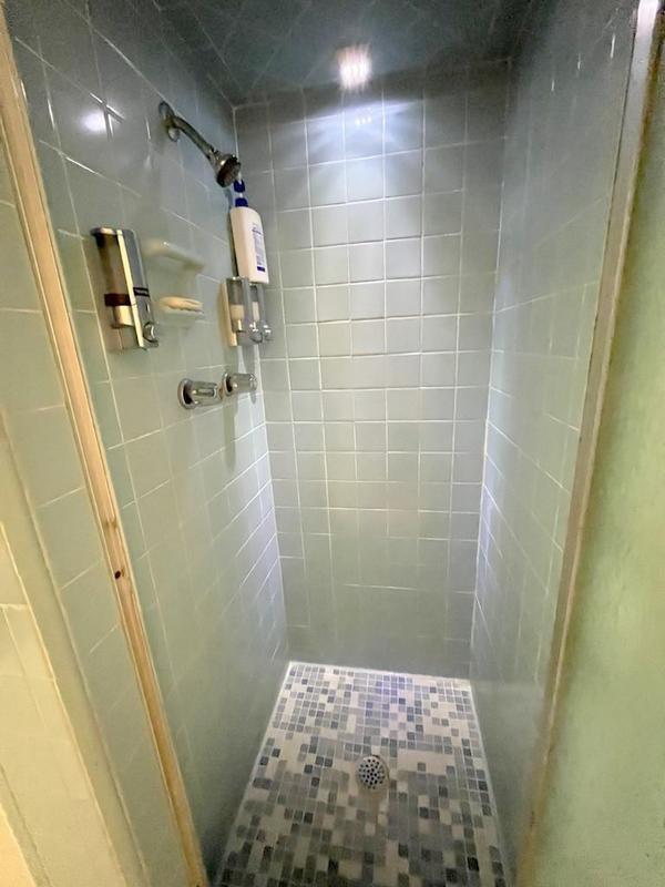 302 Cordell Dr, Crockett, TX 75835 - bathroom featuring a shower stall
