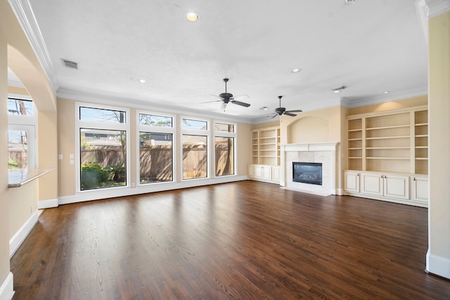 4628 Beech St, Bellaire, TX 77401 - unfurnished living room with crown molding, a fireplace, baseboards, ceiling fan, and dark wood-type flooring