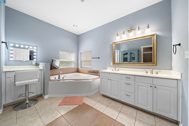3525 N Morning Glory Dr, Santa Fe, TX 77517 - bathroom featuring double vanity, a bath, and tile patterned flooring