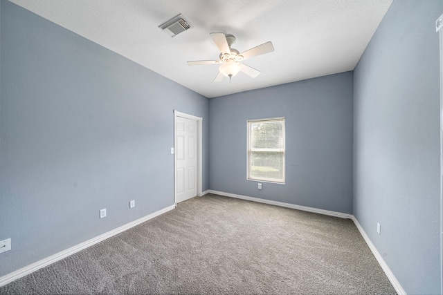 3525 N Morning Glory Dr, Santa Fe, TX 77517 - unfurnished room featuring ceiling fan, carpet flooring, and baseboards