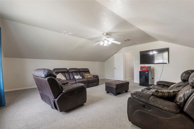 20507 Avery Grove Ct, Cypress, TX 77433 - carpeted living area featuring lofted ceiling, a ceiling fan, baseboards, and a textured ceiling